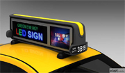 A roof-mounted, combination LED/LCD taxi advertising display system was designed to broadcast advertising campaigns in real-time based on GPS location in the cellular network.  Innovative design and engineering solutions include patented technology that allows clear screen visibility in sunlight, a custom engineered alternator designed to provide required power, gasket/seals that were critical to the unit’s weather proofing, and a structural support for the top of the taxi designed to manage the weight of the unit.<br /><br />Services included: extensive design development and engineering, LED technology, testing, tooling, prototyping, photorealistic renderings, product specification, pilot production